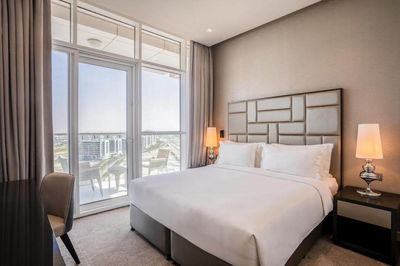 Radisson Dubai Damac Hills Hotel Exterior foto