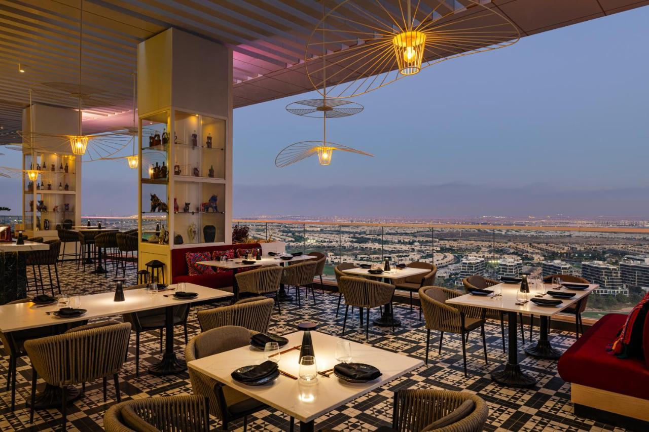 Radisson Dubai Damac Hills Hotel Exterior foto