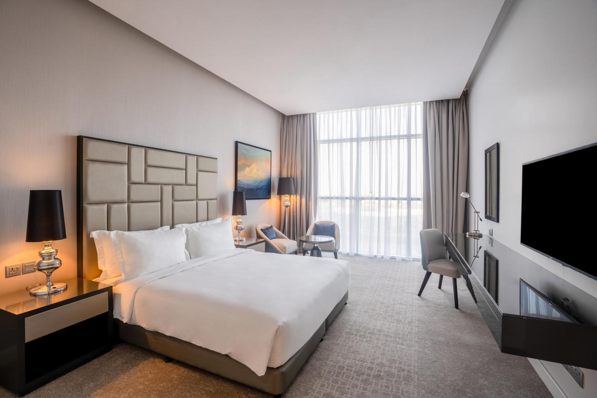 Radisson Dubai Damac Hills Hotel Exterior foto